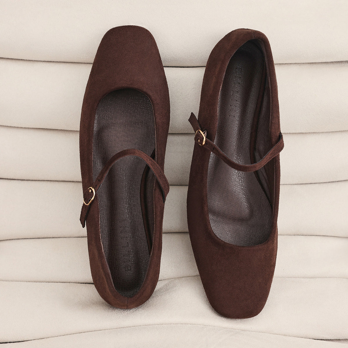 a pair of brown shoes
