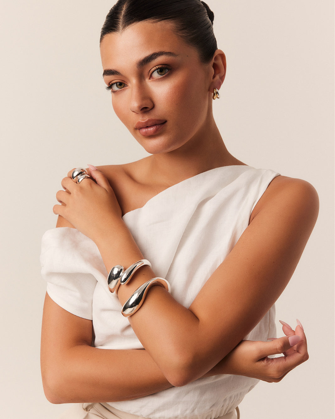 a woman wearing a white dress