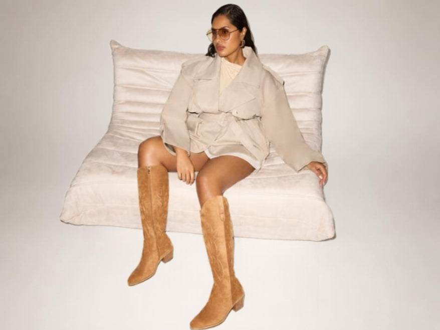 a woman sitting on a couch
