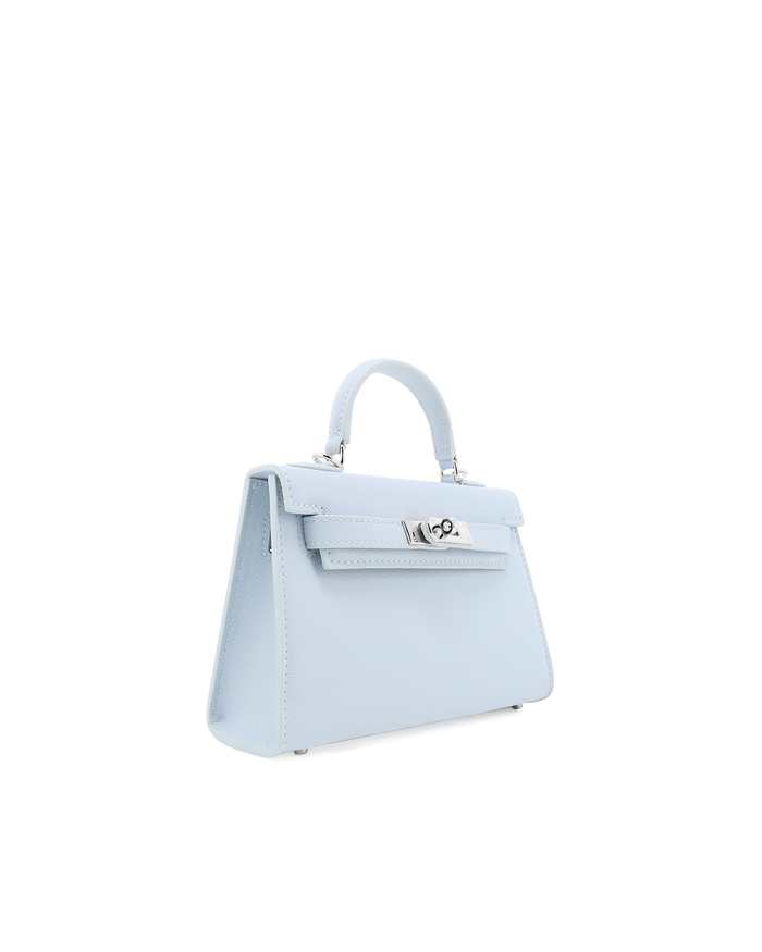 a light blue handbag with a handle