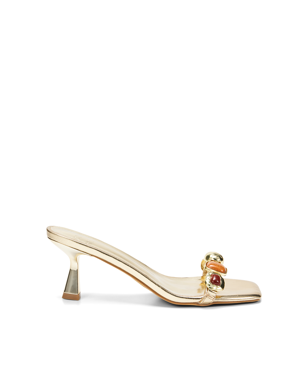 a gold high heeled shoe with a jewel on the side