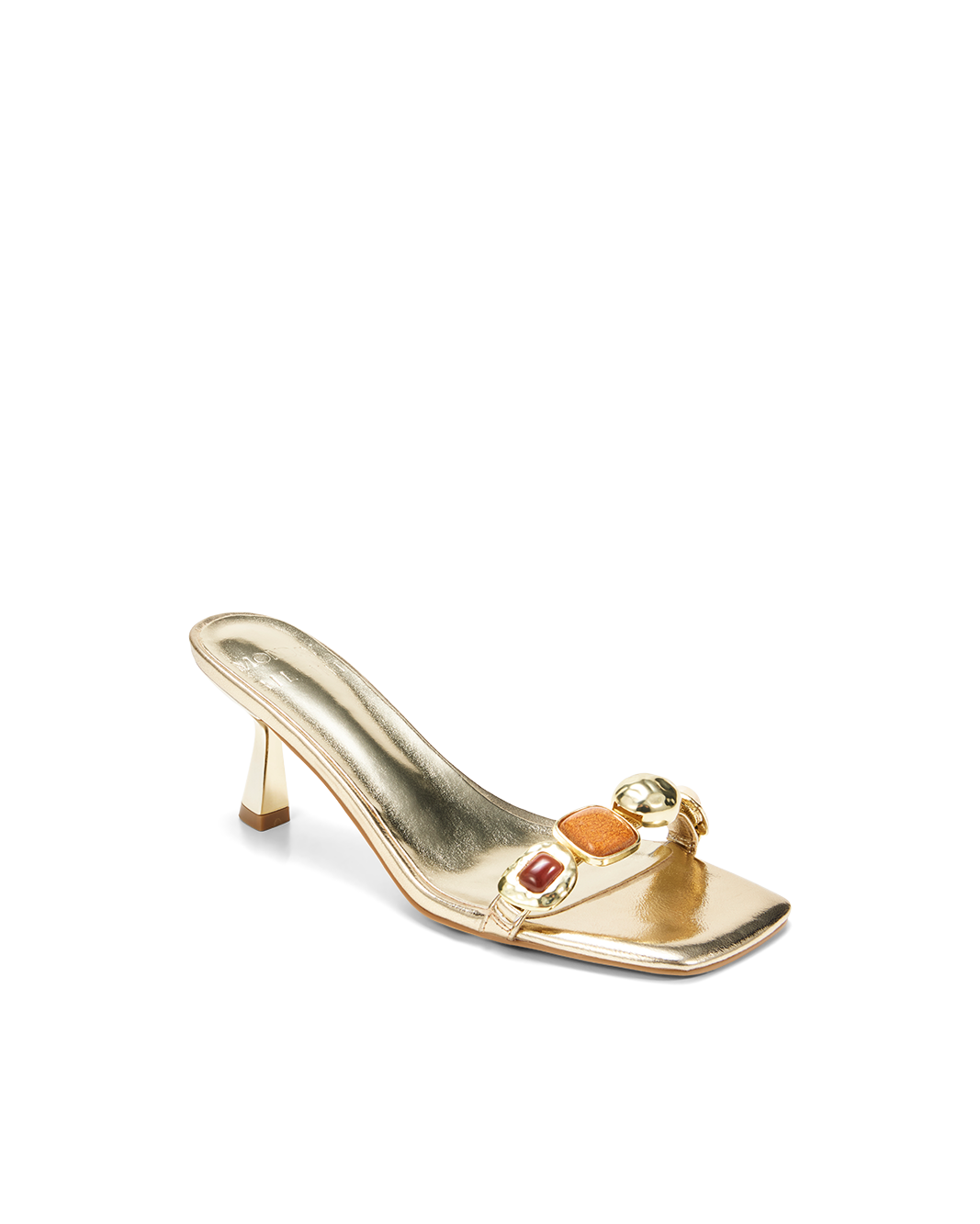 a gold high heeled shoe with a stone decoration