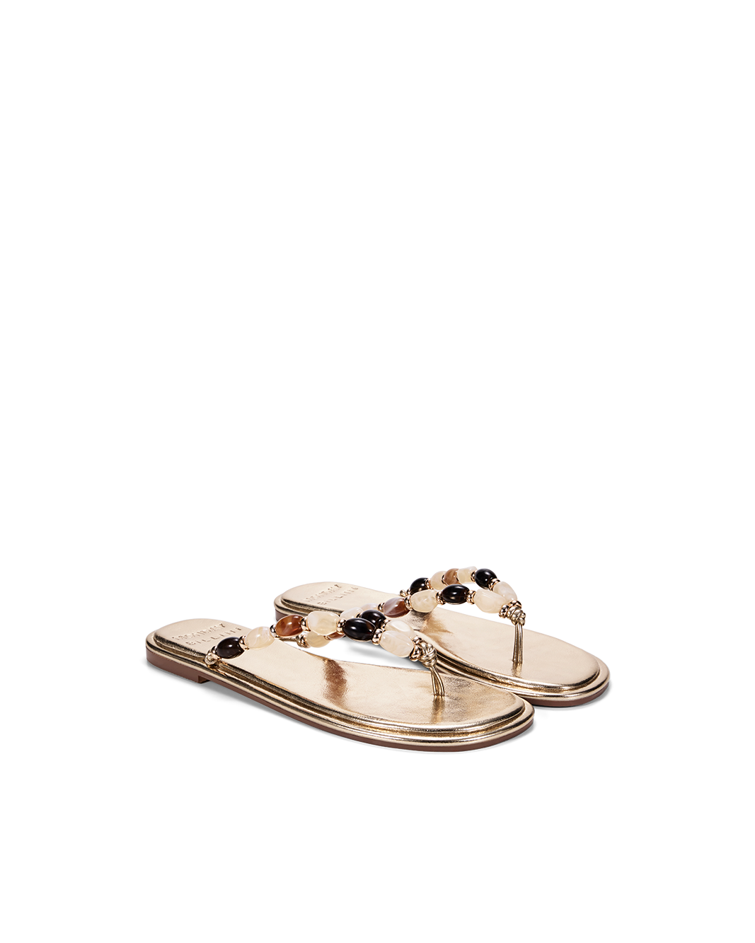 a pair of sandals with beads
